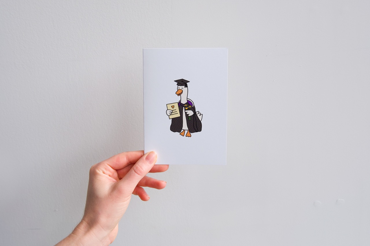 Graduation Honk held in hand